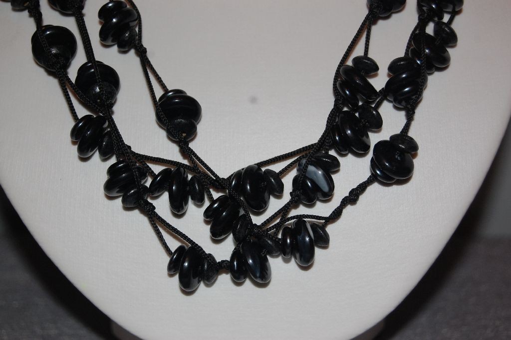 Black necklace three turns