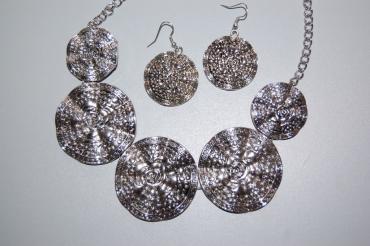 Set coins and silver roses