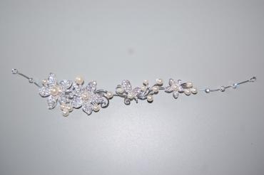 Tiara de flores con brillos y perlas