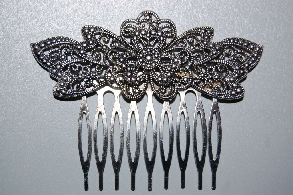 Love old silver blossom comb