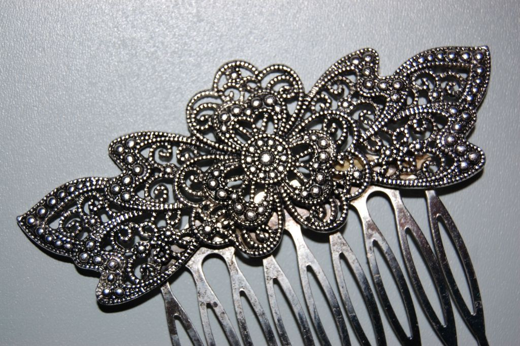Love old silver blossom comb