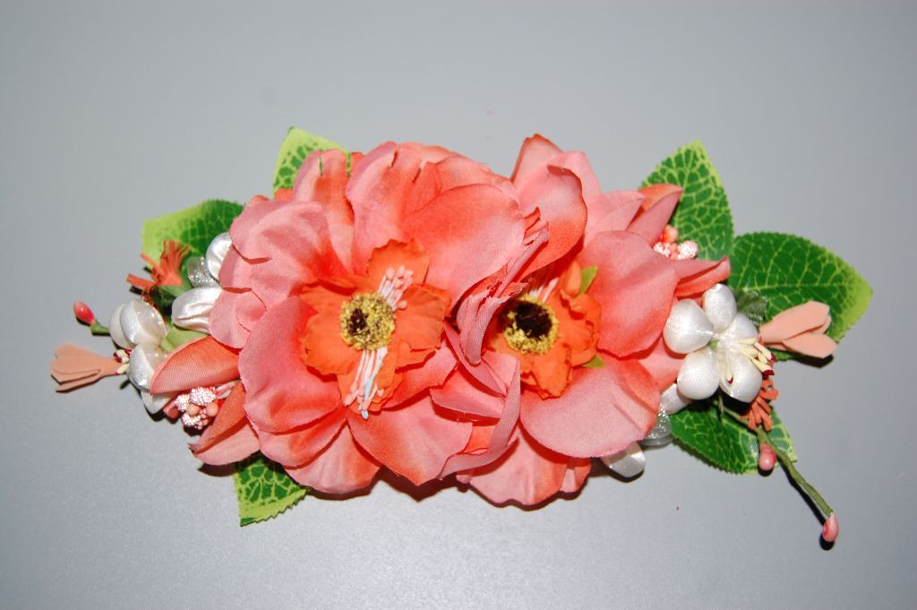 Fair beige and coral corsage