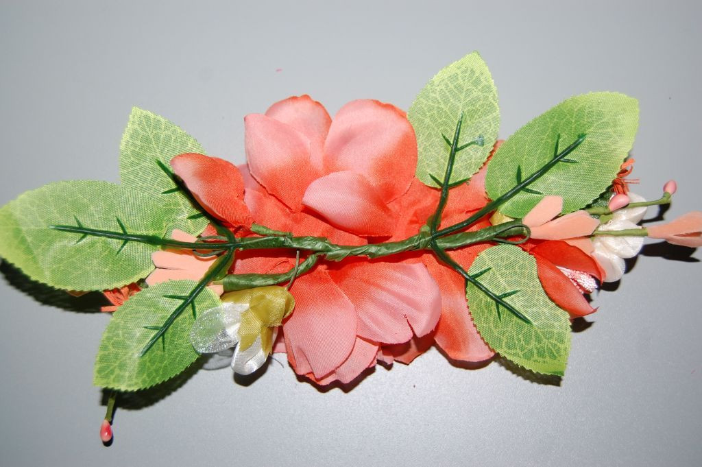 Fair beige and coral corsage