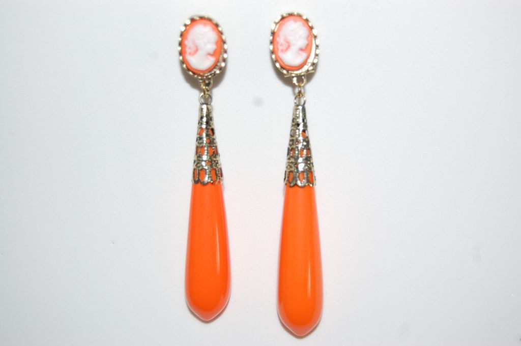Coral earrings stand oranges