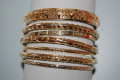 Altogether 7 Golden bracelets Claris 