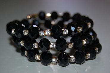 Pulsera cuentas negras y brillos blancos