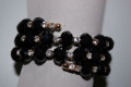 Pulsera cuentas negras y brillos blancos