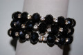 Pulsera cuentas negras y brillos blancos