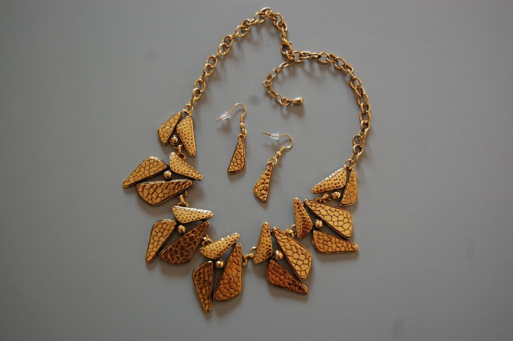 Conjunto dorado Musa