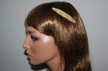 Marisa Combs golden sparkles