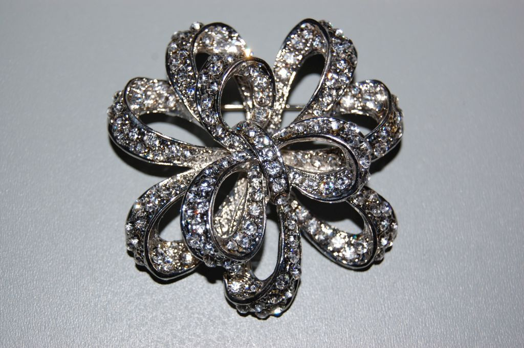 Brooch large silver lacing and glitters