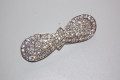Brooch lacing white sparkles