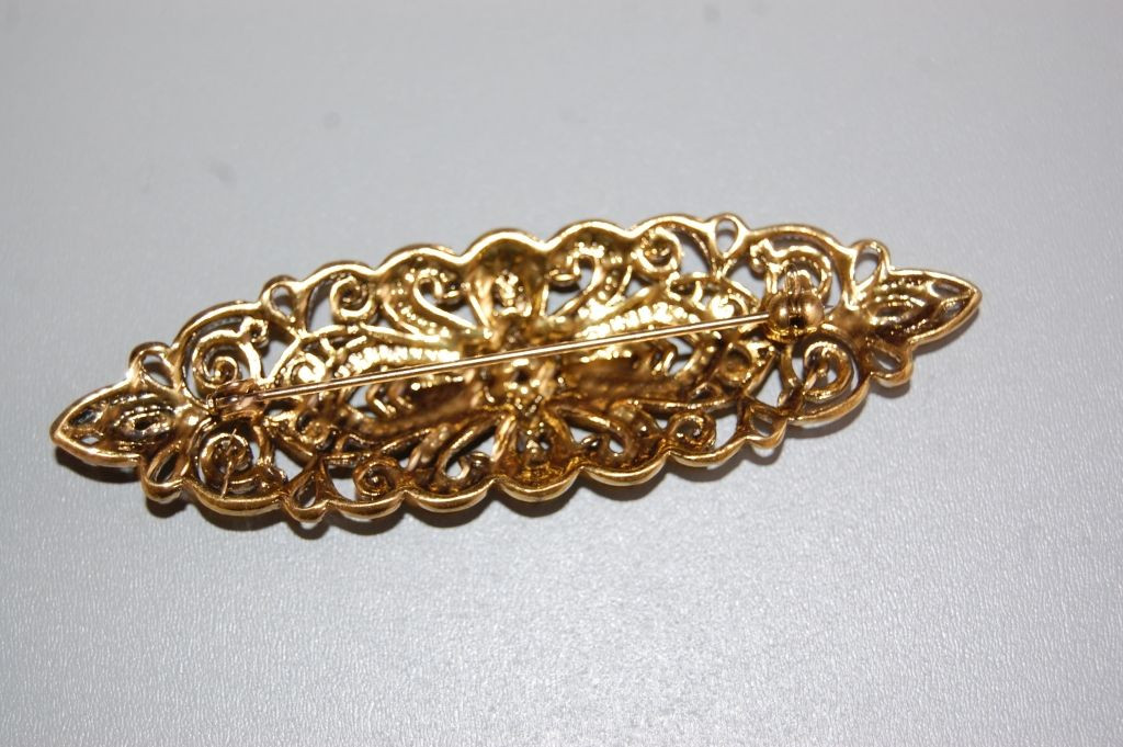 Golden hope old brooch