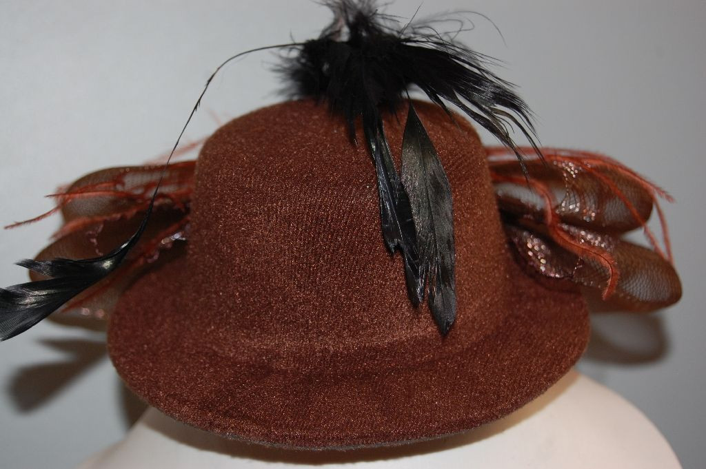 Tocado sombrero flor marrón