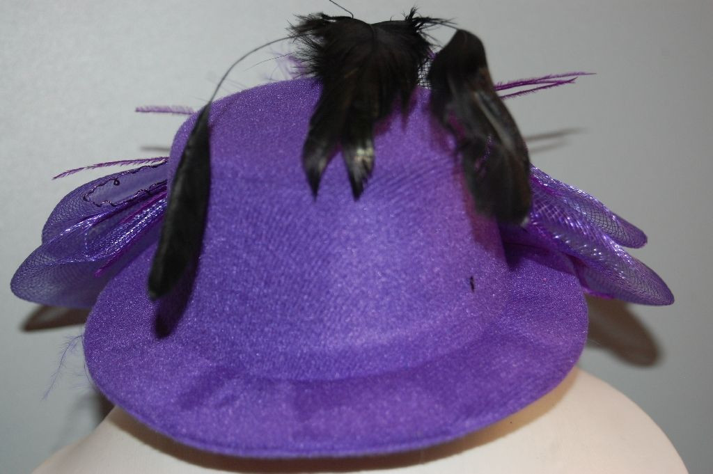 Tocado sombrero flor morado