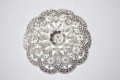 Broche Roxana oro blanco