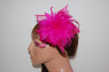 Tocado Aura plumas fucsia