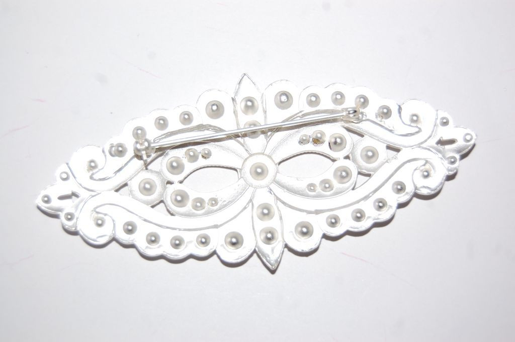 Broche Cassia oro blanco