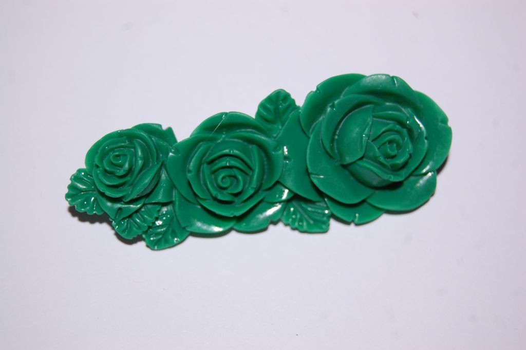 Conjunto bella peina y broche verde