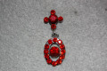 Pendientes ovalo brillos rojos