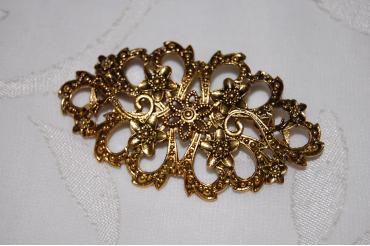 Broche dorado 9 flores