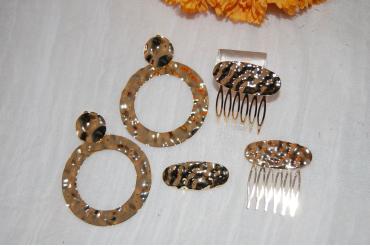 Broche ovalado dorado