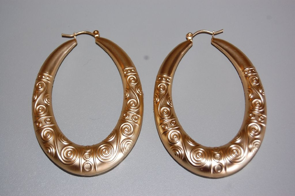 Oval golden rings