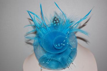 Blue headdress and black feathers