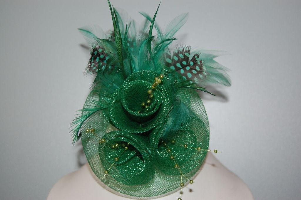Played bright green hat and feathers