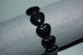 Pulsera elástica corazones negros