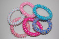 Pulsera espiral fucsia estrella