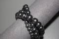 Pulsera perlas y llaves color plata-gris