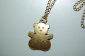 Golden bear necklace