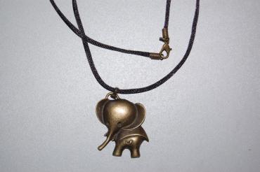 Old gold necklace with elephant