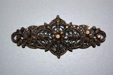 Broche fiesta elegante bronce