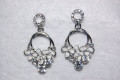 Pendientes rosas blanco roto